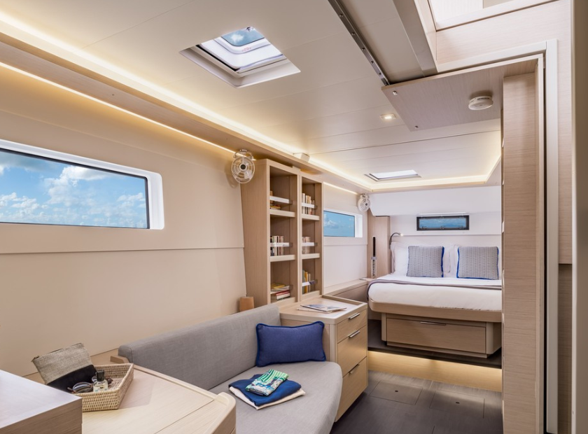 Bora fans in boat cabin with books